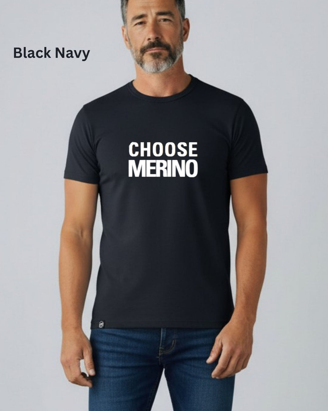 A man wearing a black t-shirt with the words &