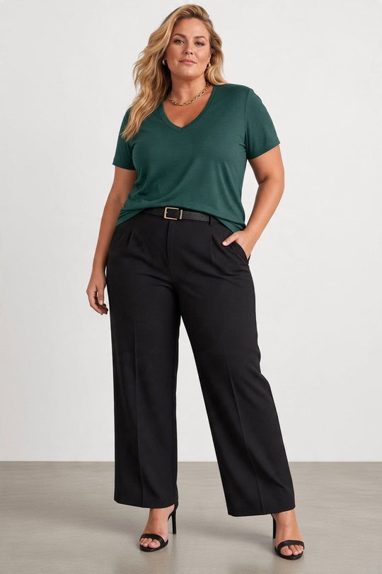 larger woman in green merino wool t-shirt