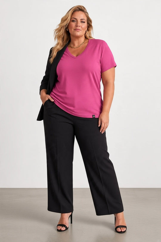 large woman in pink merino wool t-shirt