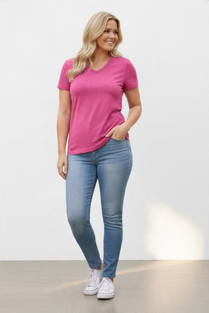 blonde woman in pink merino wool t-shirt