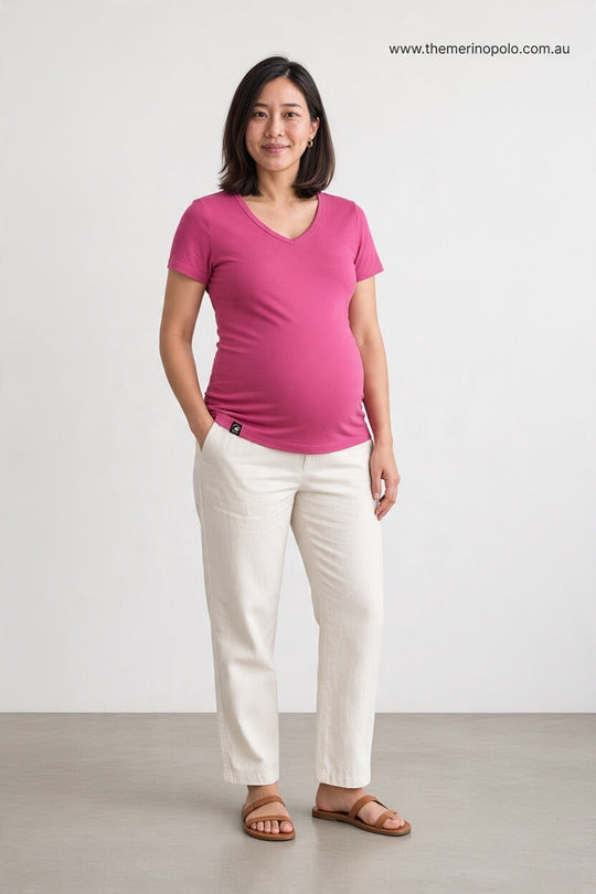 pregnant woman in pink merino wool t-shirt