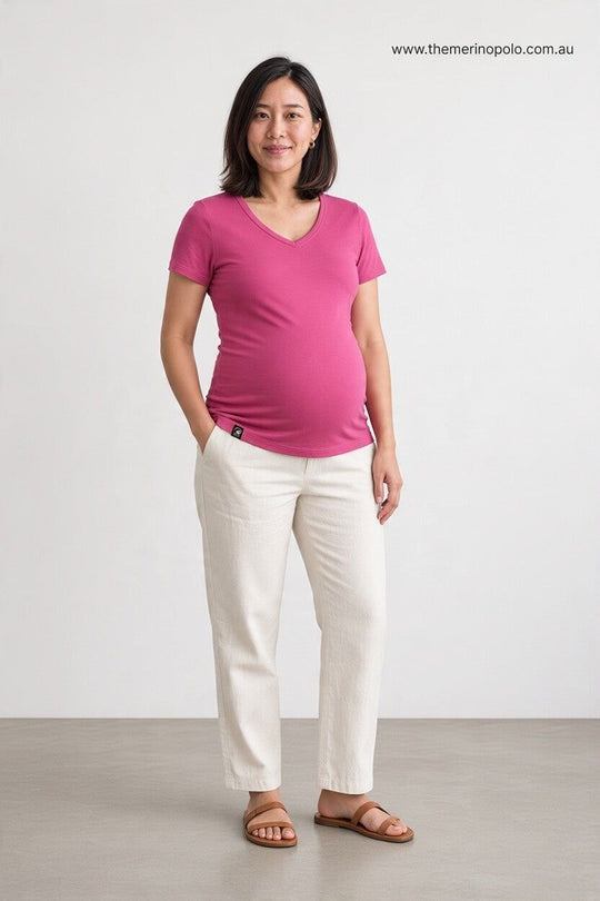 pregnant woman in pink merino wool t-shirt