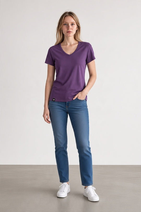 Woman standing in merino purple t-shirt