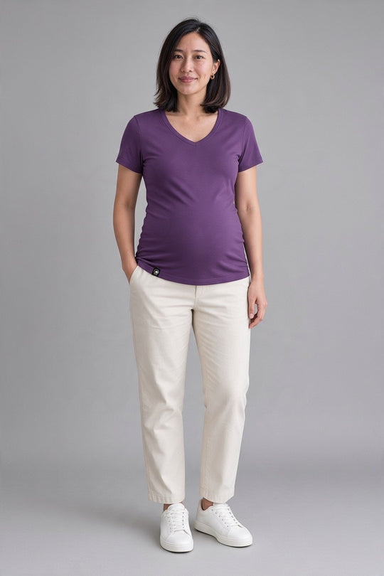 Pregnant woman in purple merino wool t-shirt