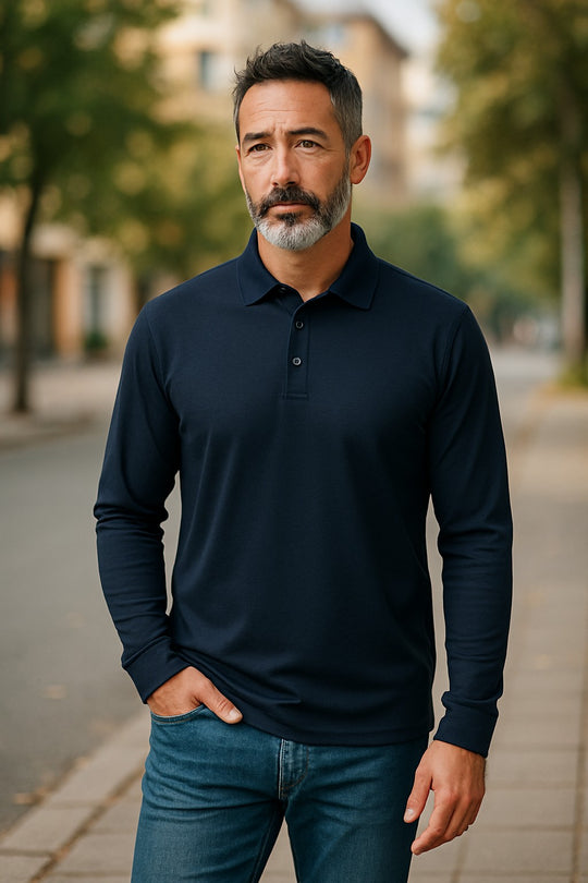 Man wearing a dark blue long-sleeve polo shirt