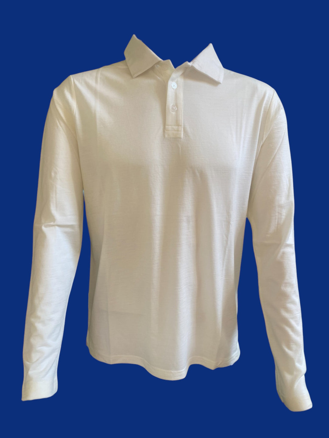 White long-sleeve shirt on a blue background