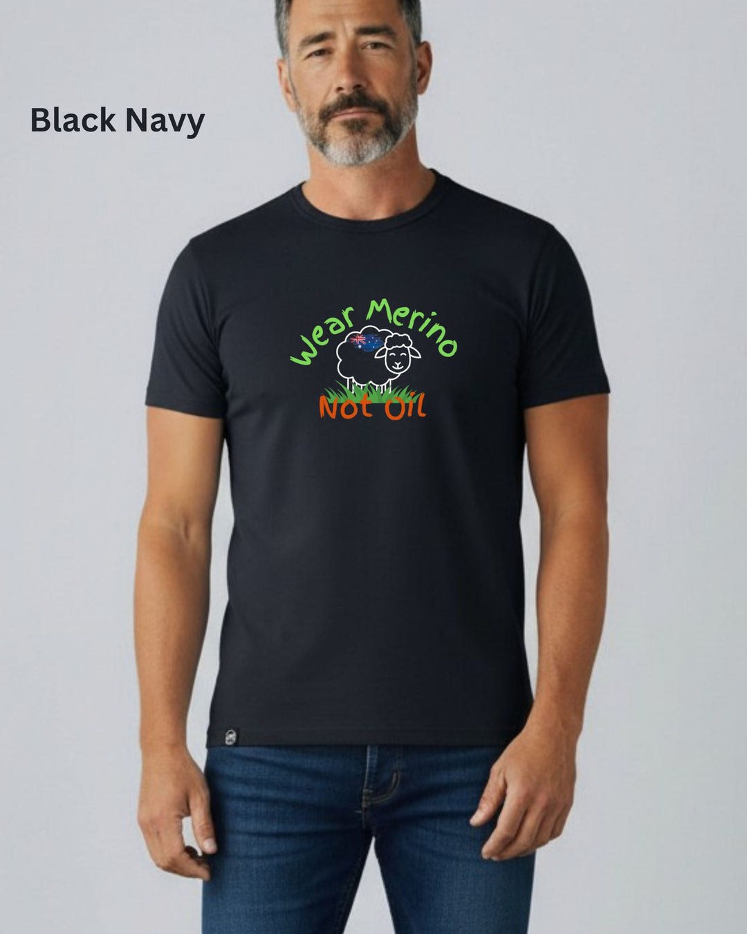A man wearing a black crew-neck t-shirt with a colorful graphic that reads &