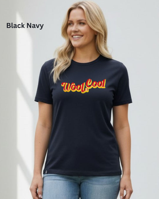 A woman wearing a black navy crewneck t-shirt with a retro &