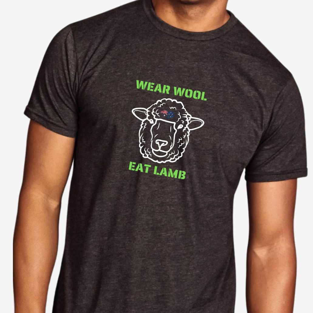Person wearing a dark gray t-shirt with a graphic of a sheep and text 'Wear Wool, Eat Lamb' on a white background