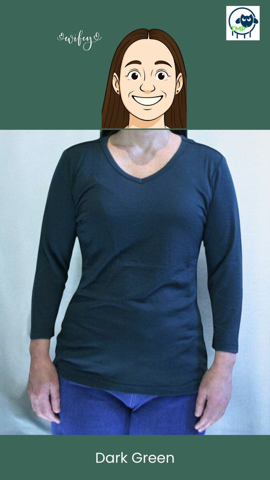 Person wearing a dark green long-sleeve shirt on a white background